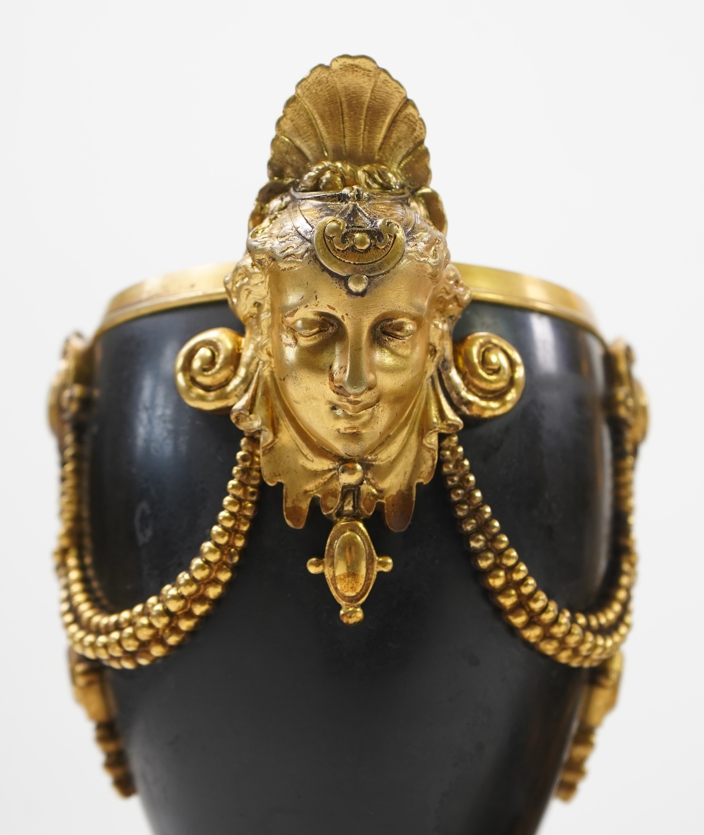 A French gilt bronze figural clock garniture, late 19th century